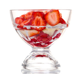 Mixed fruits and berries in glass isolated on white