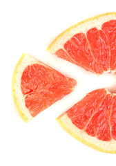 Slice of grapefruit isolated on white