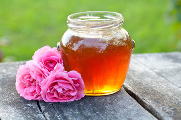 honey jar on wooden table