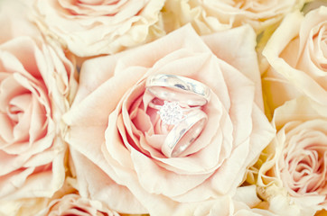 Wedding rings in roses