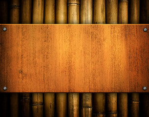 wood background with bamboo frame