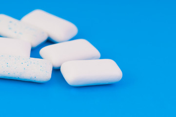 Chewing gums on blue