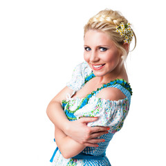 junge blonde Frau im Dirndl