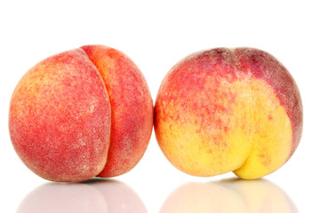 ripe peaches isolated on white.