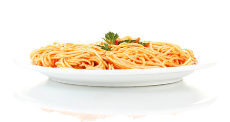 Italian spagetti cooked with tomato sauce in a white plate
