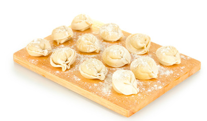 Raw Dumplings on cutting board isolated on white