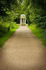 white gazebo standing alone in the park