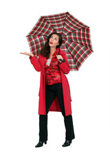 Woman in red with a tartan umbrella