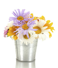 beautiful bouquet of bright wildflowers in bucket, isolated