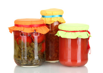Jars with canned vegetables isolated on white