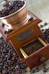 old wooden manual coffee grinder