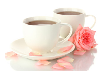 cups of tea with rose isolated on white