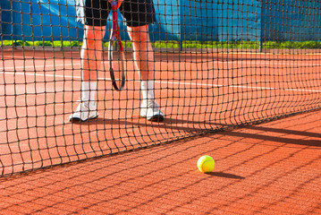 tennis player close to net