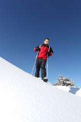 Fototapeta na wymiar Male skier on a mountain