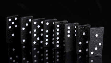 Dominoes isolated on black