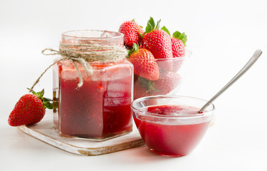 strawberries marmalade on a wooden table