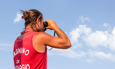 Fototapeta premium Lifeguard with binoculars