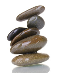 Stack of balanced stones isolated on white