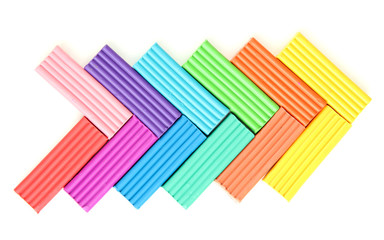 Children bright plasticine isolated on white