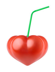 Tomato in the form of heart and drinking straw