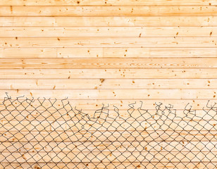 Wooden background. Wall paneling and mesh netting