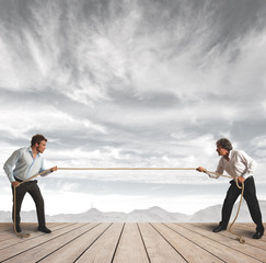 Businessman and  rope challenge