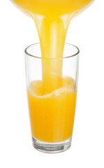 Fresh juice is poured into a glass