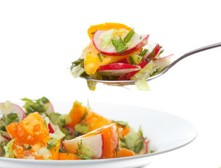 Fresh vegetable salad on white background