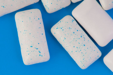 Chewing gums on blue