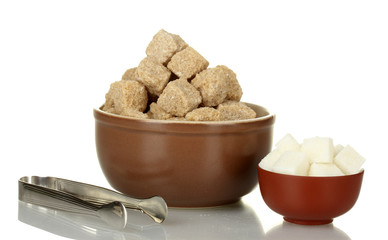 different types of sugar in bowls isolated on white close-up