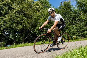 Fototapeta premium Rennradfahrer im Wettkampf
