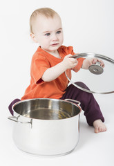 baby with big cooking pot