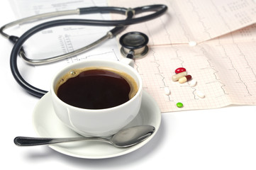 Cup of coffee and electrocardiogram