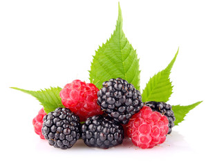 raspberry and blackberry with green leaf isolated on white