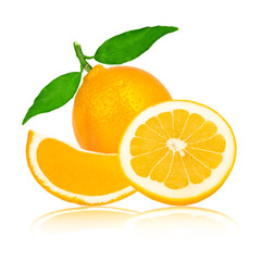 Grapefruit with leaves and slices isolated on white