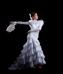 Fototapeta premium Young woman dance in white flamenco costume
