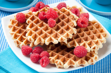 Waffles with fresh raspberries, close-up