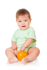 Smiling boy with orange