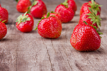 Fresh strawberries on wooden table