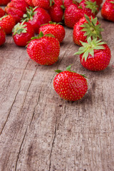 Fresh strawberries on wooden table