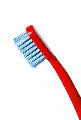 Colored toothbrush isolated on white background