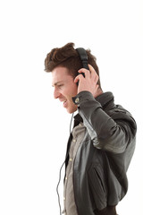 Profile of young adult male listening music