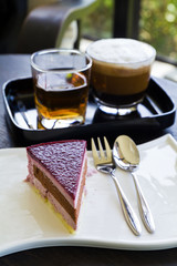 Mixed berry cheese cake with coffee