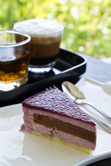 Mixed berry cheese cake with coffee