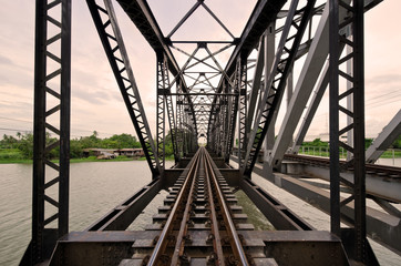 Fototapeta na wymiar Railway Bridge over the River Nakornchaisri Thailand
