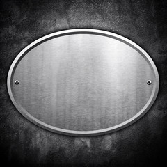 oval metal plate on wall