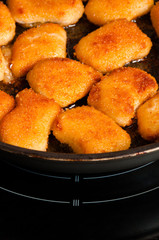Few nuggets on pan