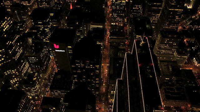 Aerial night illuminated view of a busy metropolis, USA