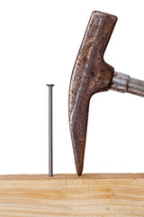 Hammer and nail with wooden board