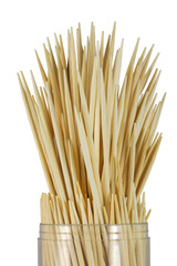 A close up shot of a wooden toothpicks on white background with